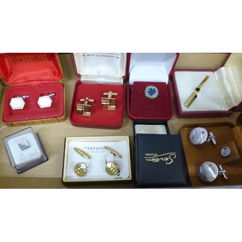 657 - A collection of tie pins, cufflinks and sets