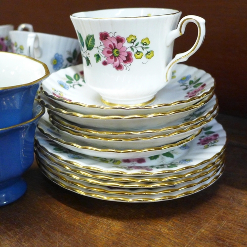 659 - A Royal Stafford bone china Bird of Paradise tea set - five cups, five saucers and five side plates,... 