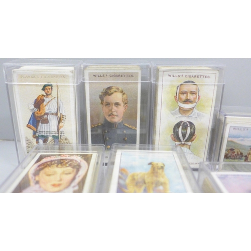 664 - Cigarette cards; twelve sets of cigarette cards including Wills (military motors, First Aid, Allied ... 