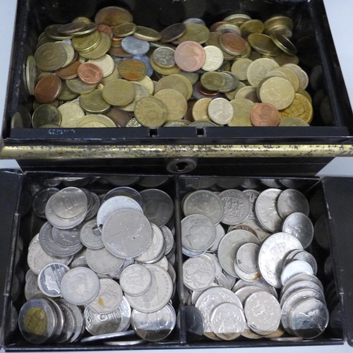 665 - A metal money box of Great Britain and world 'silver' coinage