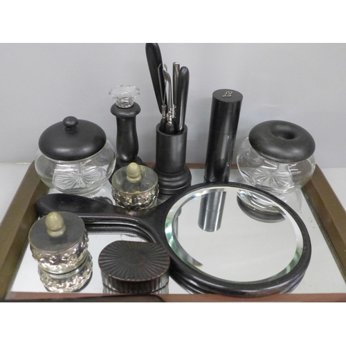 666 - An ebony dressing table set and other similar items