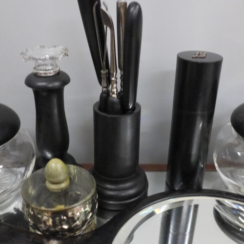 666 - An ebony dressing table set and other similar items