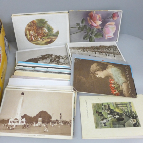 677 - A box of postcards, vintage to modern