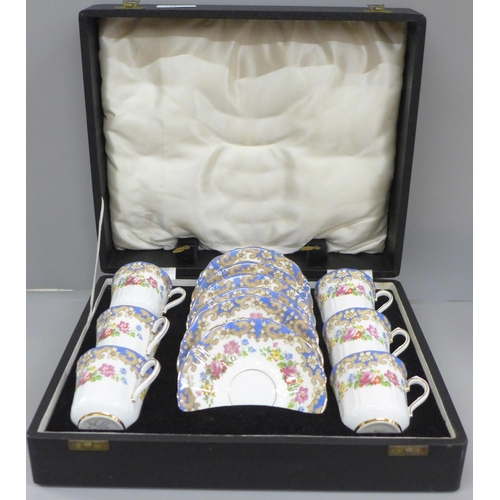 681 - An Old Royal bone china floral set of six coffee cups and saucers, cased