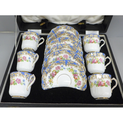 681 - An Old Royal bone china floral set of six coffee cups and saucers, cased