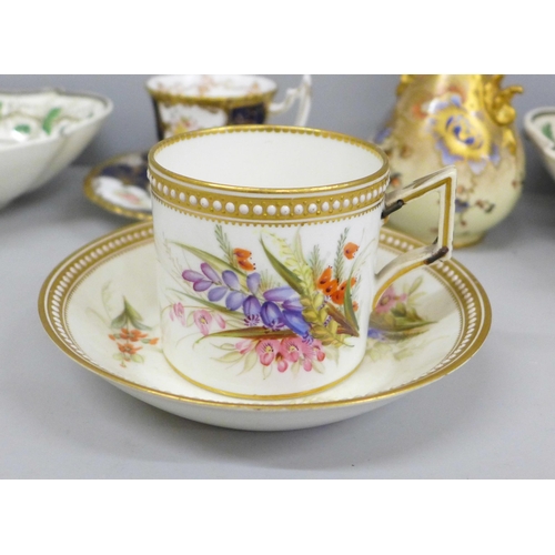 693 - A Coalport cabinet cup and saucer, a Royal Worcester cup and saucer, handle with staple repair, stam... 