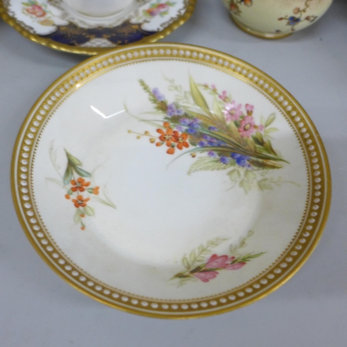 693 - A Coalport cabinet cup and saucer, a Royal Worcester cup and saucer, handle with staple repair, stam... 