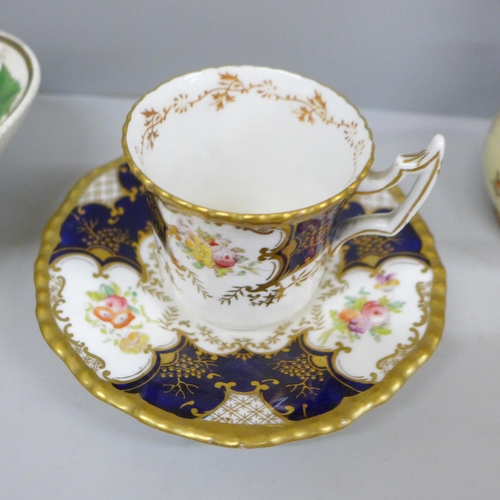 693 - A Coalport cabinet cup and saucer, a Royal Worcester cup and saucer, handle with staple repair, stam... 