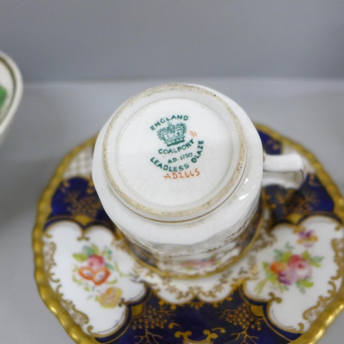 693 - A Coalport cabinet cup and saucer, a Royal Worcester cup and saucer, handle with staple repair, stam... 