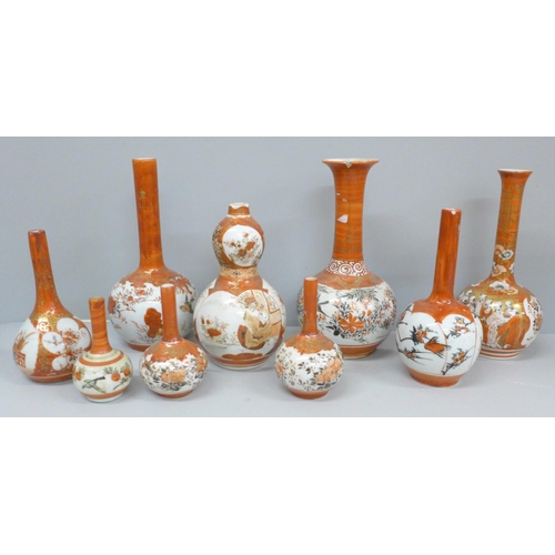 703 - A collection of nine Japanese Meiji period Kutani vases, two a/f