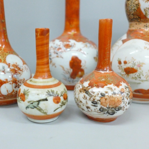 703 - A collection of nine Japanese Meiji period Kutani vases, two a/f