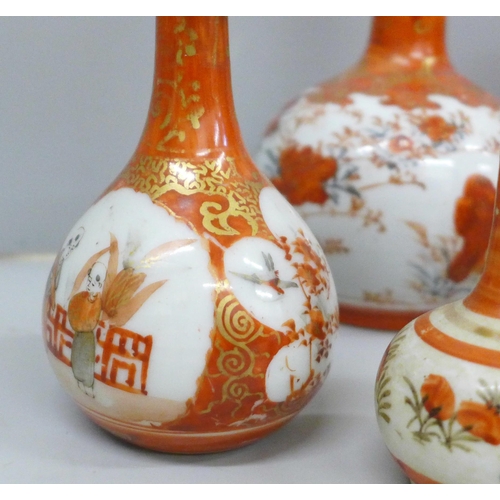 703 - A collection of nine Japanese Meiji period Kutani vases, two a/f