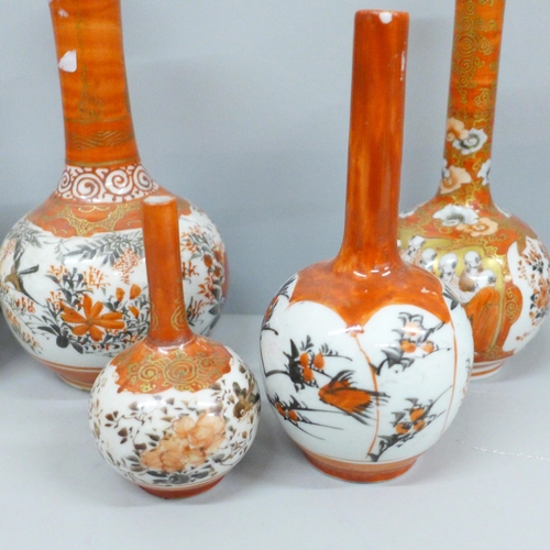 703 - A collection of nine Japanese Meiji period Kutani vases, two a/f