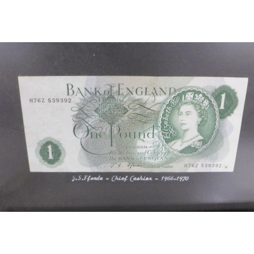 704 - Sixteen banknotes, £1 and 10 shillings, framed and mounted, Chief Cashiers include B G Catterns, K O... 