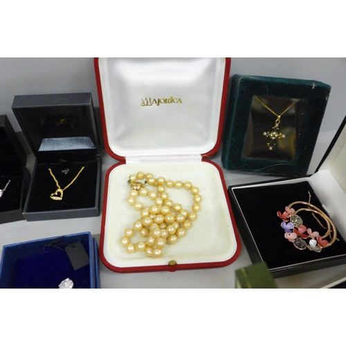 717 - Assorted boxed costume jewellery