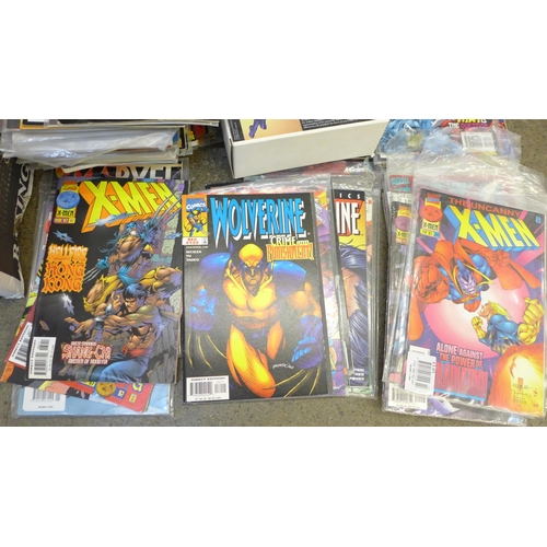 728 - A collection of Wolverine, X-men and other Marvel comics, majority 1990s, (150+) and a model Wolveri... 