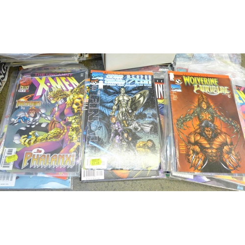 728 - A collection of Wolverine, X-men and other Marvel comics, majority 1990s, (150+) and a model Wolveri... 