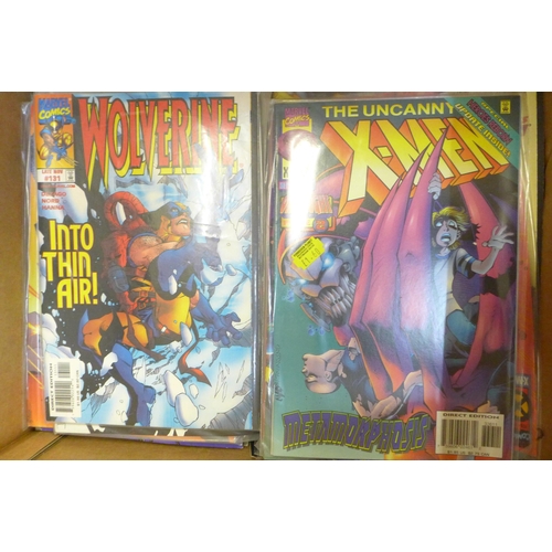 728 - A collection of Wolverine, X-men and other Marvel comics, majority 1990s, (150+) and a model Wolveri... 