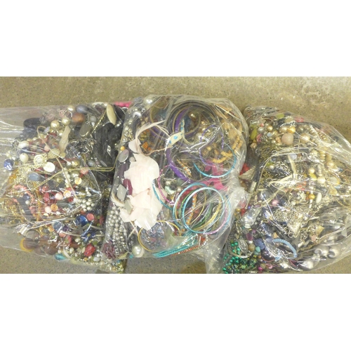 729 - Three large bags of costume jewellery