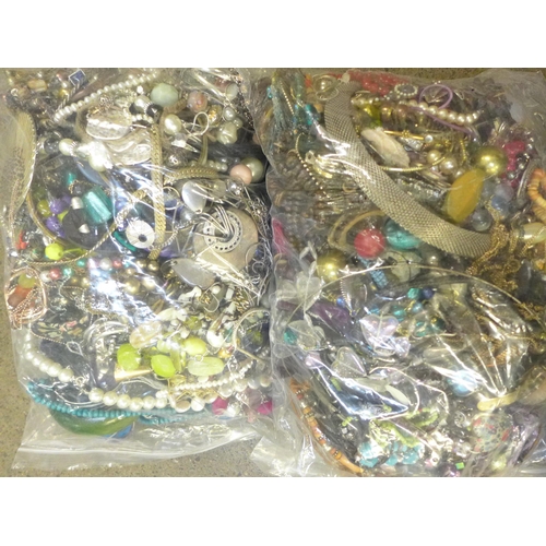 731 - Two bags of costume jewellery