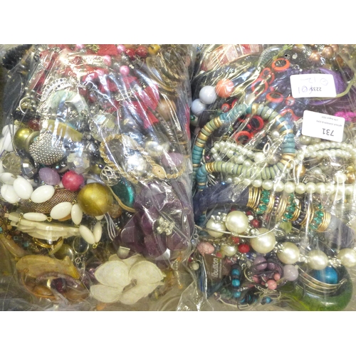 731 - Two bags of costume jewellery