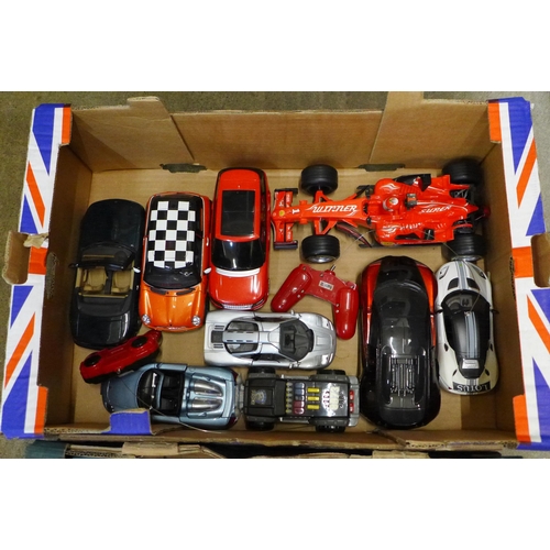 734 - Two boxes of model vehicles, Burago, Welly, Beanstalk Group and remote control cars