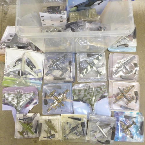 736 - A large box of assorted model aircraft in sealed packets