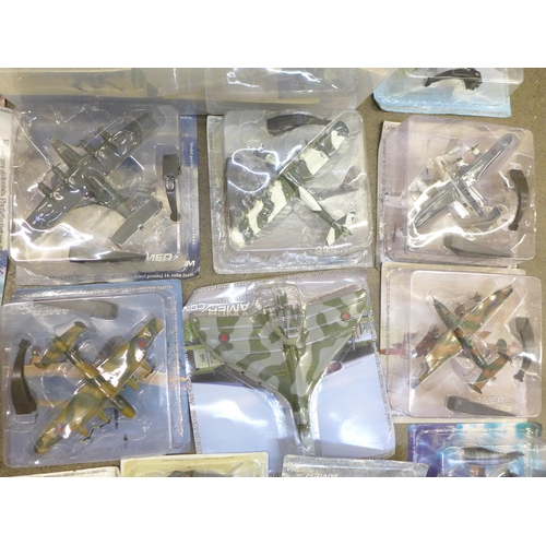 736 - A large box of assorted model aircraft in sealed packets