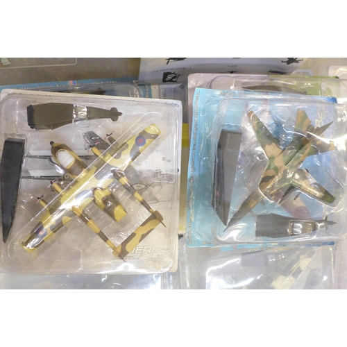 736 - A large box of assorted model aircraft in sealed packets