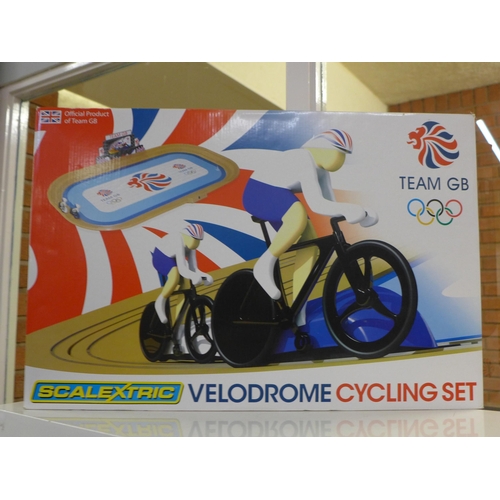 737 - A wooden model of a yacht, a wooden toy train and a Team GB Scalextric Velodrome cycling set