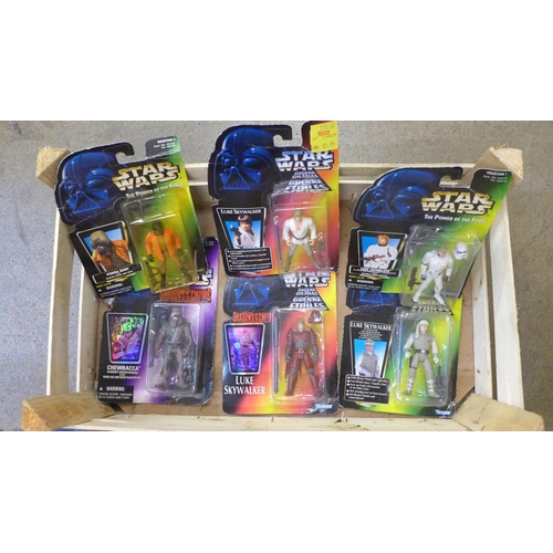 738 - A collection of 24 1990s Kenner Star Wars figures, all sealed