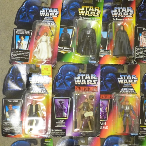 738 - A collection of 24 1990s Kenner Star Wars figures, all sealed