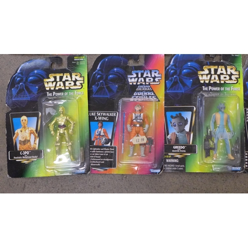 738 - A collection of 24 1990s Kenner Star Wars figures, all sealed