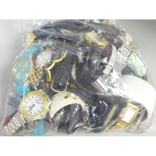 742 - A bag of lady's and gentleman's wristwatches