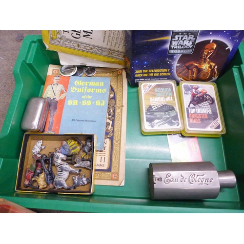 757 - Assorted items; lead figures, Top Trumps, Tazo, handcuffs, etc.