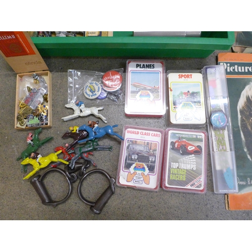 757 - Assorted items; lead figures, Top Trumps, Tazo, handcuffs, etc.