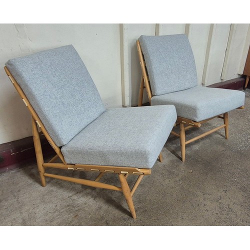 16 - A pair of Ercol Blonde beech 427 model easy chairs