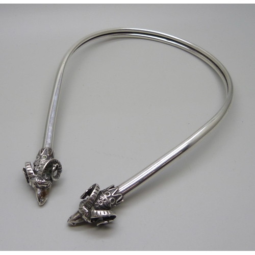 882 - A rams head detail silver torc collar, maker R.A., 80g