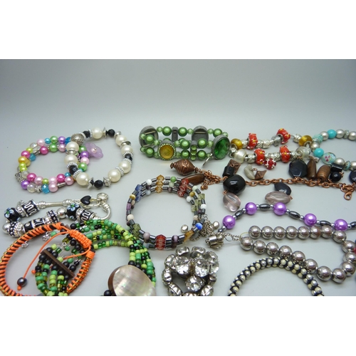 889 - A collection of costume bracelets