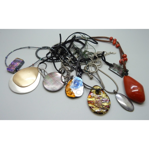 890 - A collection of pendants