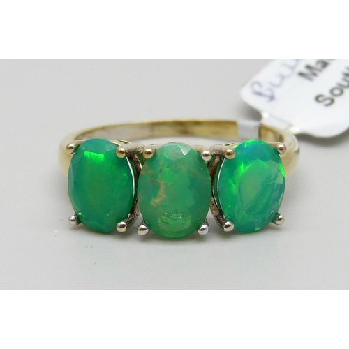 909 - A silver gilt blue opal ring, U