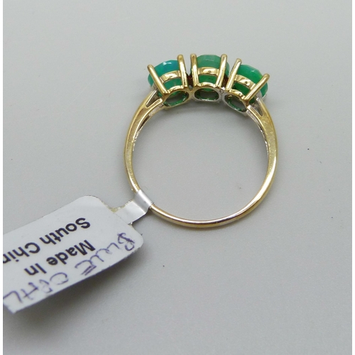 909 - A silver gilt blue opal ring, U