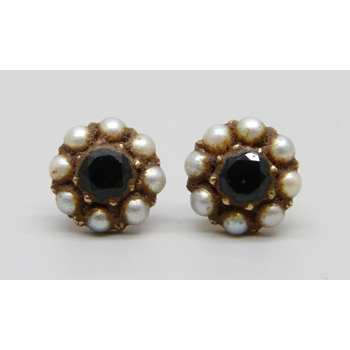 941 - A pair of yellow metal, seed pearl and sapphire stud earrings, one lacking butterfly, 3.3g