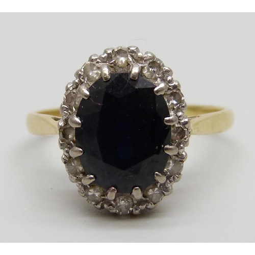 948 - An 18ct gold sapphire and diamond cluster ring, 4g, Q