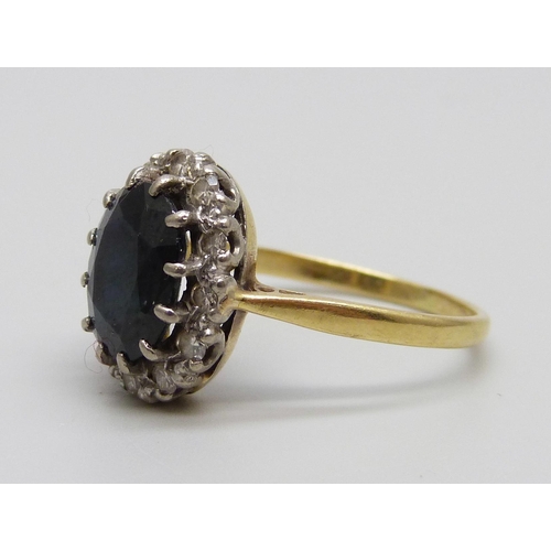 948 - An 18ct gold sapphire and diamond cluster ring, 4g, Q