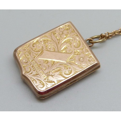 952 - An Edward VII 9ct gold floral engraved locket, Birmingham 1903, on a 9ct gold chain, 8.4g, chain 47c... 