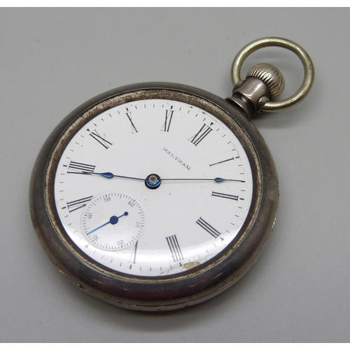 963 - A silver cased Waltham top-wind railway pocket watch, the case back with US locomotive detail in gol... 