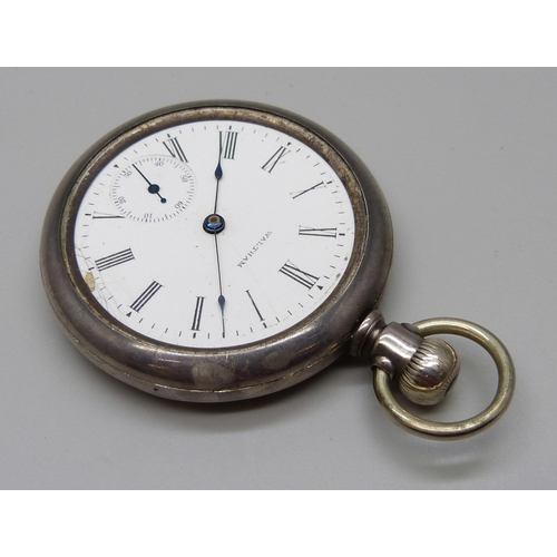 963 - A silver cased Waltham top-wind railway pocket watch, the case back with US locomotive detail in gol... 