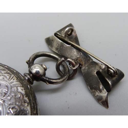 973 - An 800 silver fob watch on a silver hanging brooch