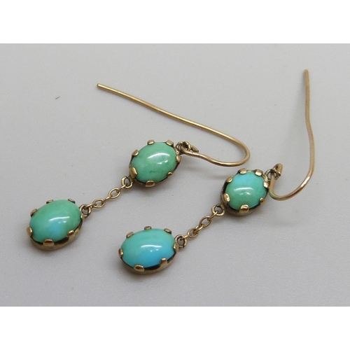 978 - A pair of yellow metal and turquoise drop earrings